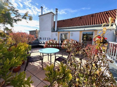 SONNENDURCHFLUTETER TERRASSENDACHAUSBAU