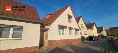 Einfamilienhaus mit 127m² in ruhiger Lage inklusive Garten mit Wasserzugang, Carport und Garage.