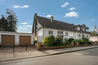 Großzügiges Zweifamilienhaus mit weitläufigem Grundstück – Perfekt für Mehrgenerationenwohnen