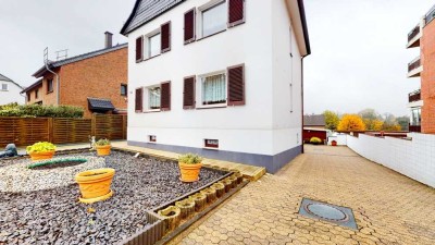 Gemütliches Ein-/ Zweifamilienhaus mit großzügigem Gartengrundstück und 2 Garagen in Hilden-Ost