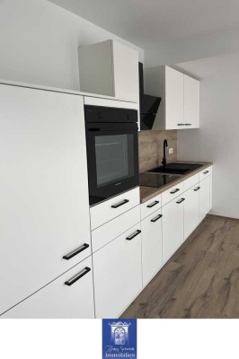 Wohlfühlwohnung mit Balkon und moderner Ausstattung im Erstbezug! Rollstuhlgerecht!