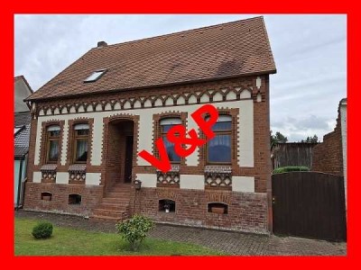Einfamilienhaus mit Nebengelass und großem GS.