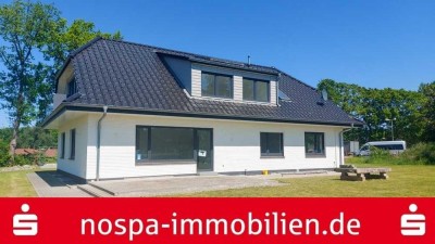 Neuwertiges und geräumiges Einfamilienhaus mit Potenzial zur Grundstücksteilung!