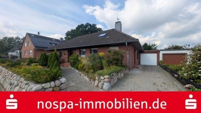 Mit Ausbaupotenzial! Winkelbungalow mit Garage in ruhiger Lage von Schleswig-Nord!