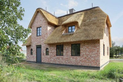 Neubau unter Reet mit CO2 Zertifizierung