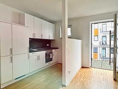 Neubau-Wohnung: Einbauküche, Balkon, Fußbodenheizung, Parkett, Stellplatz u.v.m.
