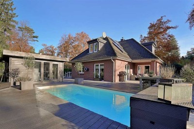 Ein Ort zum Wohlfühlen und Genießen! 
Modernes Wohnen mit Pool und Gartenidylle