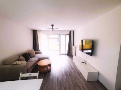 Freundliche 2-Zimmer-Wohnung mit Balkon und Tiefgarage - teilmöbliert.