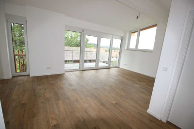 "Moderne 2-Zimmer-Dachgeschosswohnung mit Loft-Charakter und Alpenflair!"