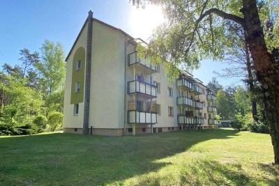 Charmante 3-Zimmer-Wohnung mit Garten im malerischen Rauen. Anlageimmobilie