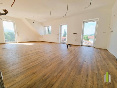 Erstbezug über den Dächern – 2-Zimmer-Dachgeschosswohnung mit zwei Balkonen &amp; Stil