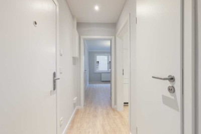 Moderne 1,5-Zimmer-Erdgeschosswohnung mit Einbauküche und modernen Duschbad in Harburg