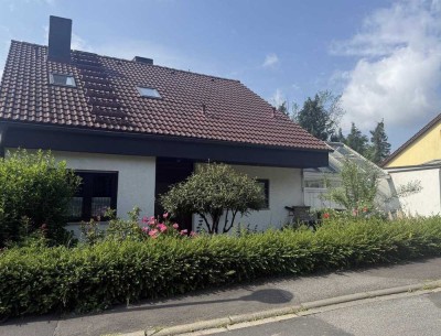 3,5-Zimmer Wohnung auf 3 Ebenen mit Wintergarten, Kamin, Garage und großem Gartenanteil in Kürnach