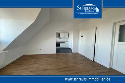 3-Zimmer-Dachgeschosswohnung mit Einbauküche im modernisierten Altbau