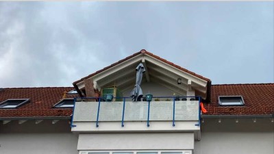 Charmante Maisonette-Dachgeschosswohnung mit Weitblick und Tiefgaragenstellplatz