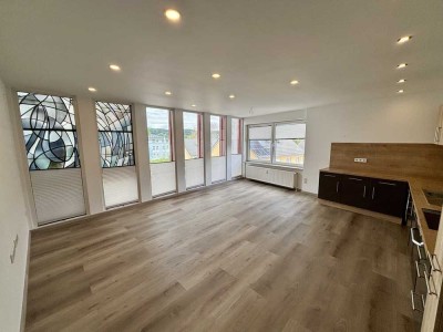 Moderne lichtdurchflutete Wohnung mit eigener Terasse und Stellplätzen