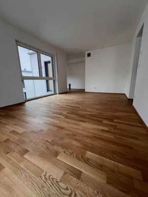 Lichtdurchflutete 4-Zimmer-Neubauwohnung mit Balkon und Dachterrasse auf zwei Ebenen