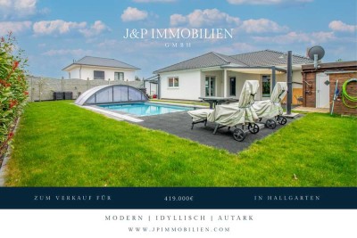 Modernes und autarkes Einfamilienhaus in idyllischer Lage mit gehobener Außenanlage und Pool