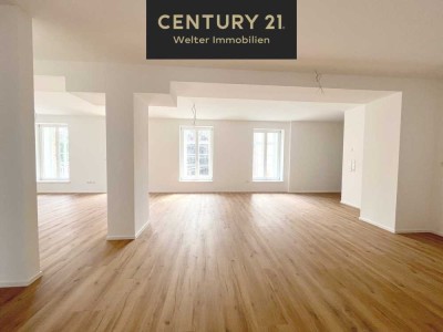 Großzügige 3-Zimmer-Erstbezug-Wohnung mit Balkon und viel Altbau-Chic!