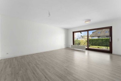 Attraktive 5-Zimmer-Erdgeschosswohnung mit eigenem Gartenanteil und Einbauküche