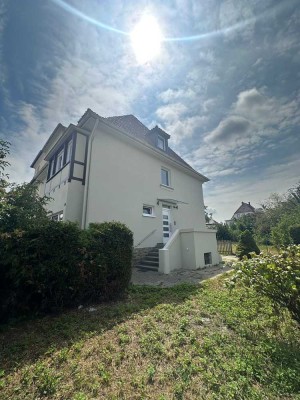 Top saniertes und modernisiertes Mehrfamilienhaus mit 3Wohnungen und zusätzlichen Bauland