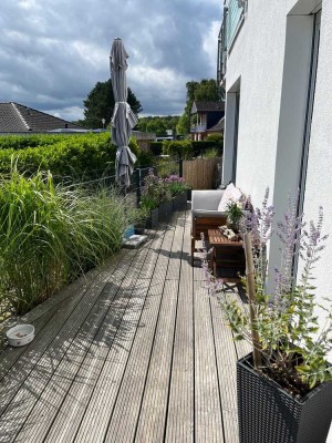 Lichtdurchflutete Erdgeschosswohnung mit großer Terrasse und Tiefgarage