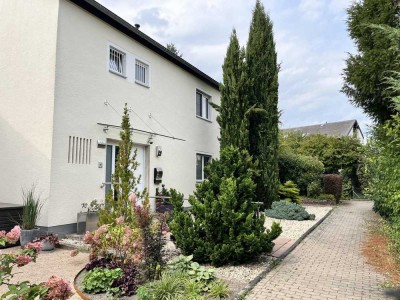 Modernisiertes Wohnhaus in Top-Lage mit großem Garten