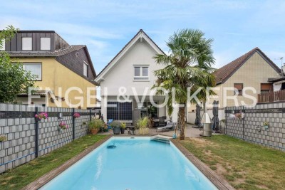 Nachhaltig saniert: Ihr energieeffizientes Zuhause mit Pool und Garten