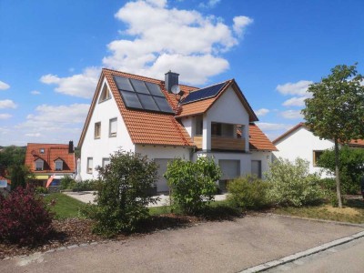 Großzügiges Mehrfamilienhaus mit sonnigem Grundstück und gehobener Innenausstattung