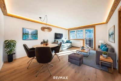 Sanierte Perle mit alpinem Flair: Exklusive 2-Zimmer-Wohnung