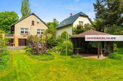 IMMOBERLIN.DE - Attraktives Haus mit großem Südgarten & Garage in sehr familiärer Lage