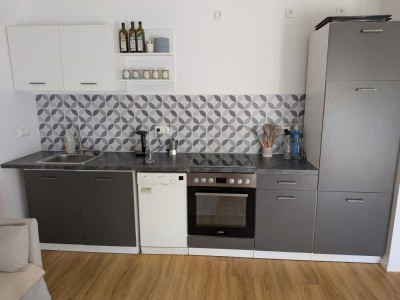 Top-Lage am Ryck: Moderne 1-Zimmerwohnung mit Terrasse