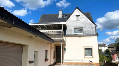 Kompaktes 1-Familienhaus mit schönem Blick, Garage und Garten!