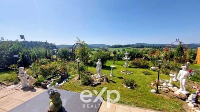 Qualität, die überzeugt: Lärchenfassade, Fußbodenheizung und günstige Energiebilanz