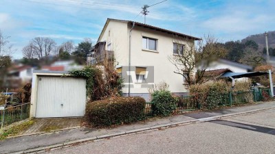 Idyllisches Zweifamilienhaus mit großzügigem Garten in schöner Lage!