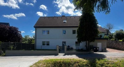 Sanierte Wohnung in 2-Familienhaus mit Garten