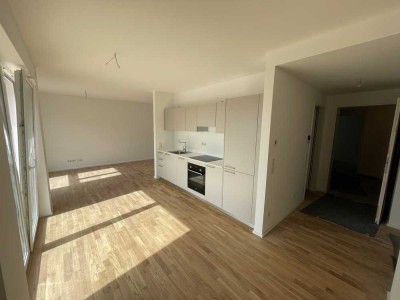 Neubau- 1-ZKB-Wohnung mit Einbauküche und Balkon