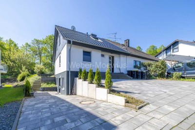 Attraktives Einfamilienhaus mit ELW, 2 Terrassen + Garten in Zentrumslage