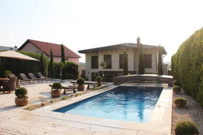 Privates Paradies in Bestlage – mediterraner Wohntraum mit Pool und Weitblick