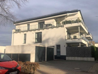 Neuwertige Erdgeschosswohnung im Energiesparhaus mit Terrasse in Südlage