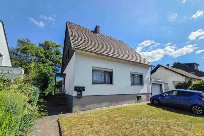 Chance ergreifen ! - Einfamilienhaus mit Anbau Einliegerwohnung und großem Grundstück in Refrath