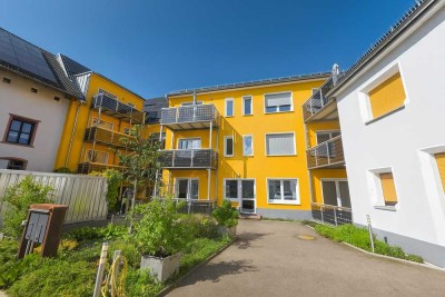 Effizienz trifft Eleganz: Hochwertige Wohnung mit großem Balkon im energieautarken Passivhaus!