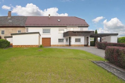 Familienfreundliches und attraktives Landhaus mit Einliegerwohnung und großem Garten