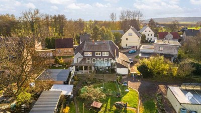 Idyllisches EFH mit Einliegerwohnung, großem Grundstück, Terrasse und 4 Garagen in Milzau