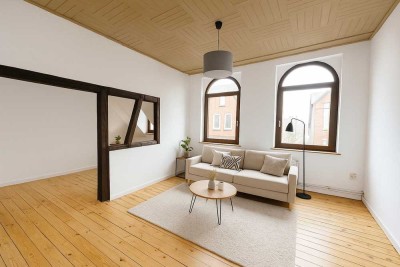 Sanierungsbedürftige Dachgeschosswohnung mit Potenzial