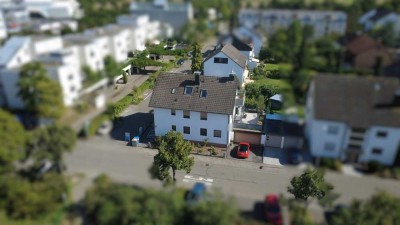 Attraktives Mehrfamilienhaus in Karlsruhe-Neureut mit traumhaftem Garten und Doppelgarage