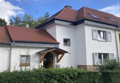 Bereit für die Zukunft? Familienzuhause mit idyllischem Garten