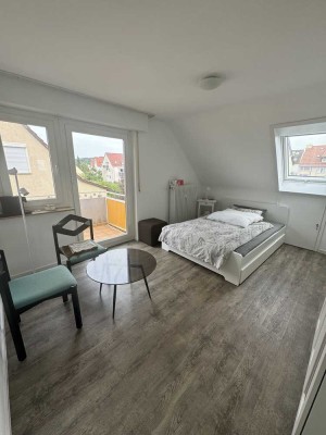 Moderne Einzimmerwohnung in Toplage mit Balkon und Gartenanteil