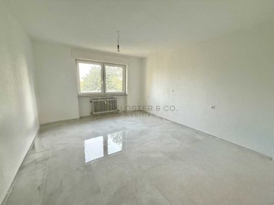 Sanierte 3,5-Zimmer-Wohnung mit Aufzug, Balkon & Einzelgarage