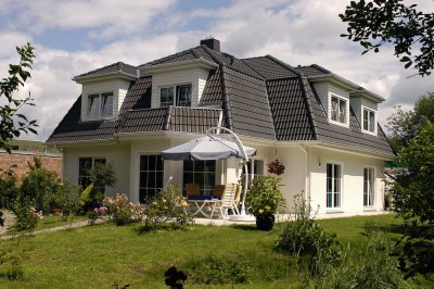 Einfamilienhaus verkaufen - besten Kaufpreis erhalten - Zusammenarbeit mit DOMICIL REAL ESTATES